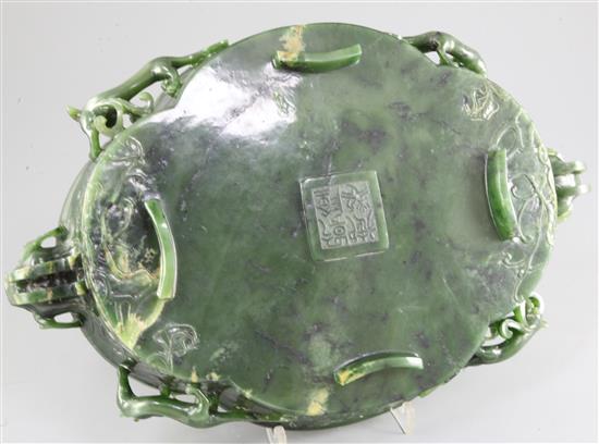 A large Chinese spinach green jade quatre-lobed bowl, Qianlong mark, width 37cm